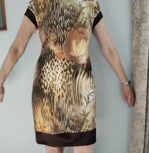 Cache beautiful dress.  Animal print with gold shimmer. Fabulous look.